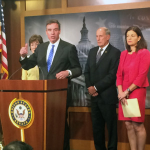 Sens. Mark Warner (center), Susan  Collins (left), Dan Coats and Kelly Ayotte introduce the FISMA Reform Act Wednesday.