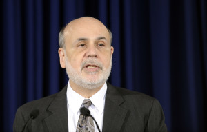Federal Reserve Chairman Ben Bernanke speaks during a news conference at the Federal Reserve in Washington, Wednesday, Dec. 18, 2013. The Fed will begin to reduce bond purchases by $10 billion in January because of a stronger U.S. job market.(AP Photo/Susan Walsh)